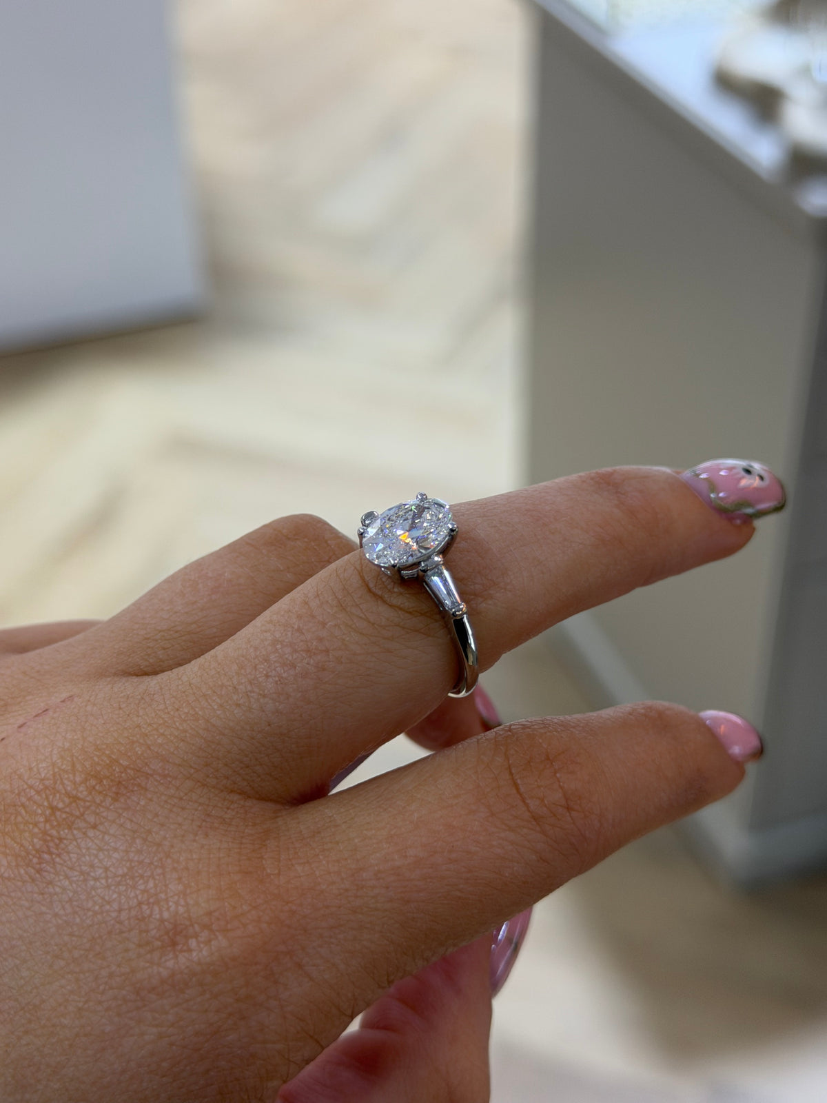 The Florence oval and tapered baguette lab grown diamond ring, platinum, alternate view