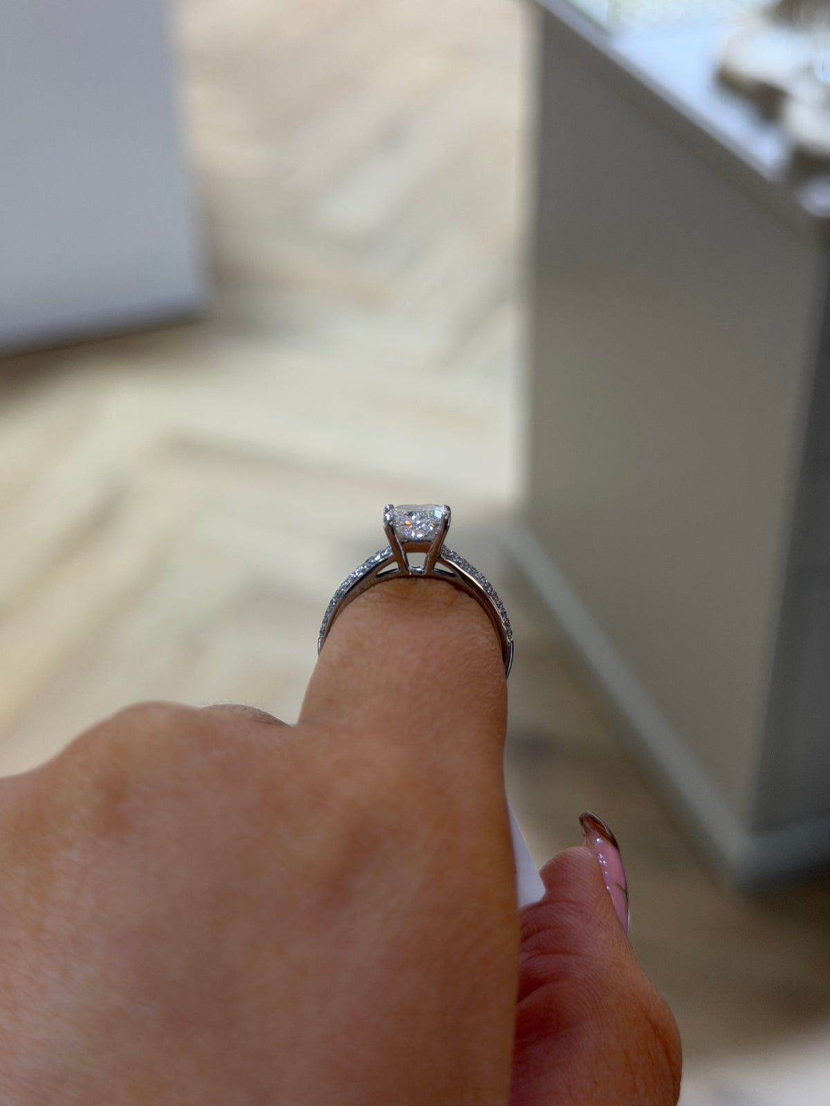 The Camille 1.5ct cushion lab diamond ring in 9k white gold, side view on the hand