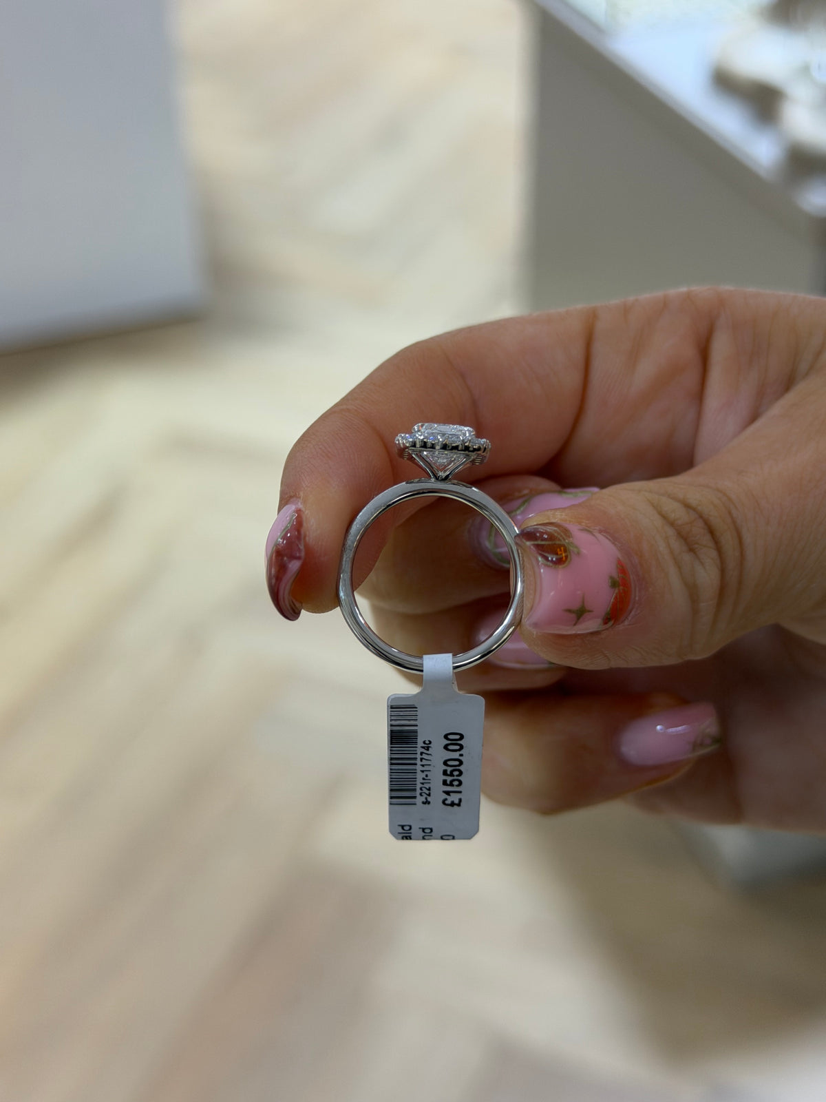 The Opulence 2ct emerald cut lab diamond with diamond halo, platinum