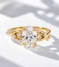The Entwine, 2.5ct oval lab grown diamond engagement ring with twisted vine band in 9k yellow gold