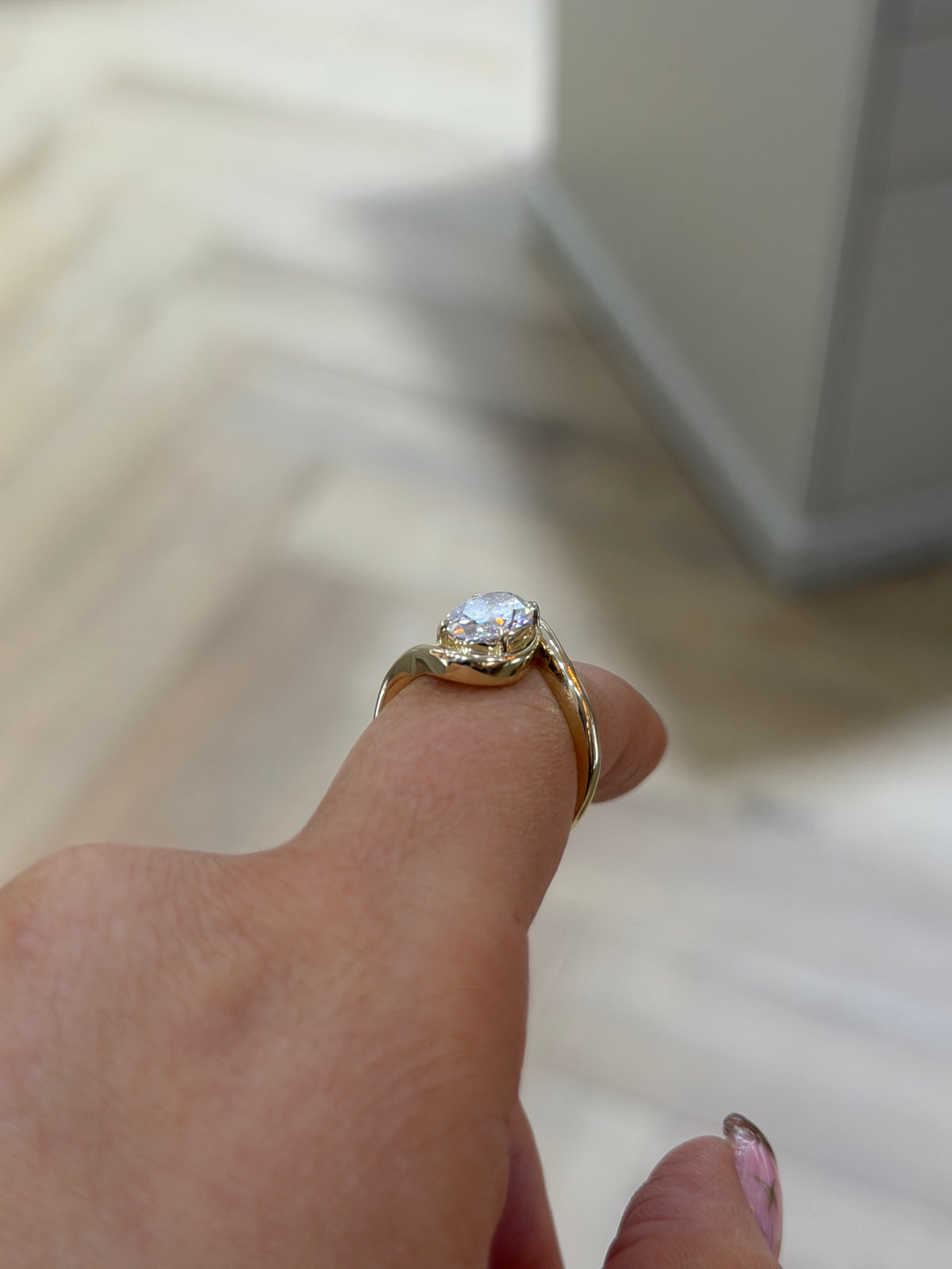 The Embrace oval lab grown diamond bezel ring, 9k yellow gold, alternate view