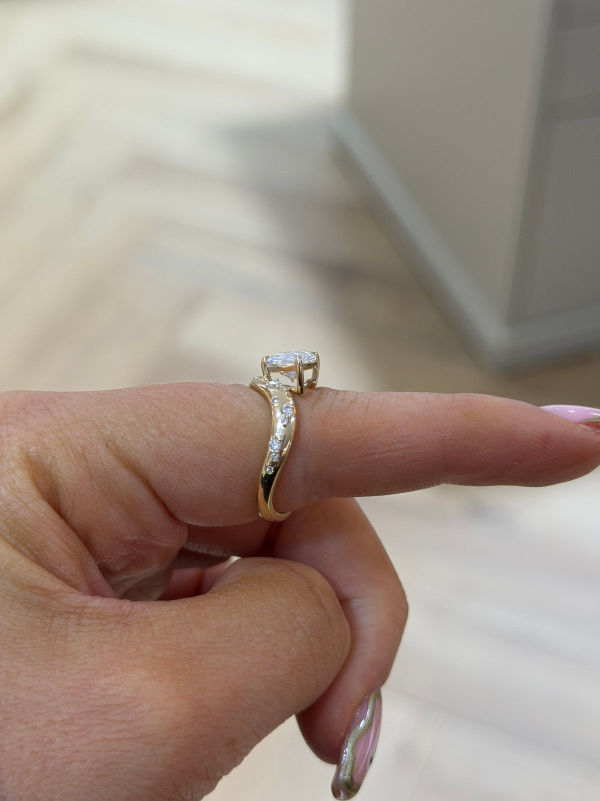 The Orbit east-west pear cut lab grown diamond ring, 9k yellow gold, alternate view