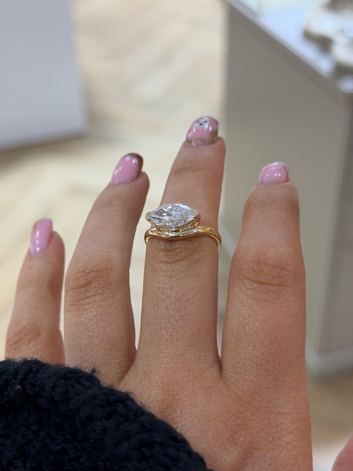 The Solstice 2ct marquise lab diamond ring in 9k yellow gold, alternate view on the hand