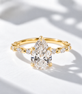 The Tear Drop, 2.5ct pear shape lab grown diamond engagement ring with accented band in 9k yellow gold