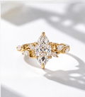 Aurelia 2.5ct marquise lab grown diamond engagement ring in 9k yellow gold with vine-style marquise side stones