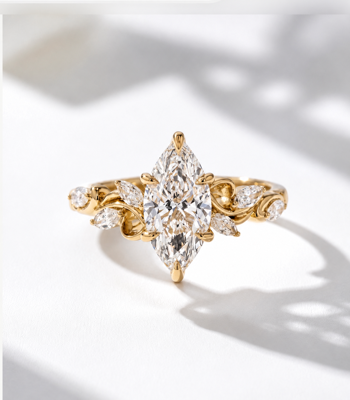 Aurelia 2.5ct marquise lab grown diamond engagement ring in 9k yellow gold with vine-style marquise side stones