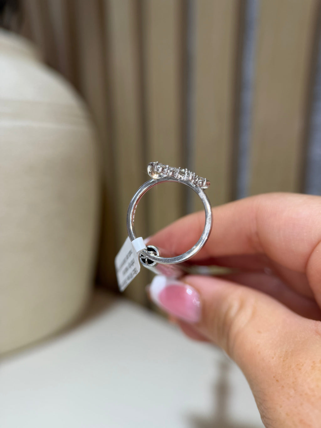Bow infinity diamond ring side view