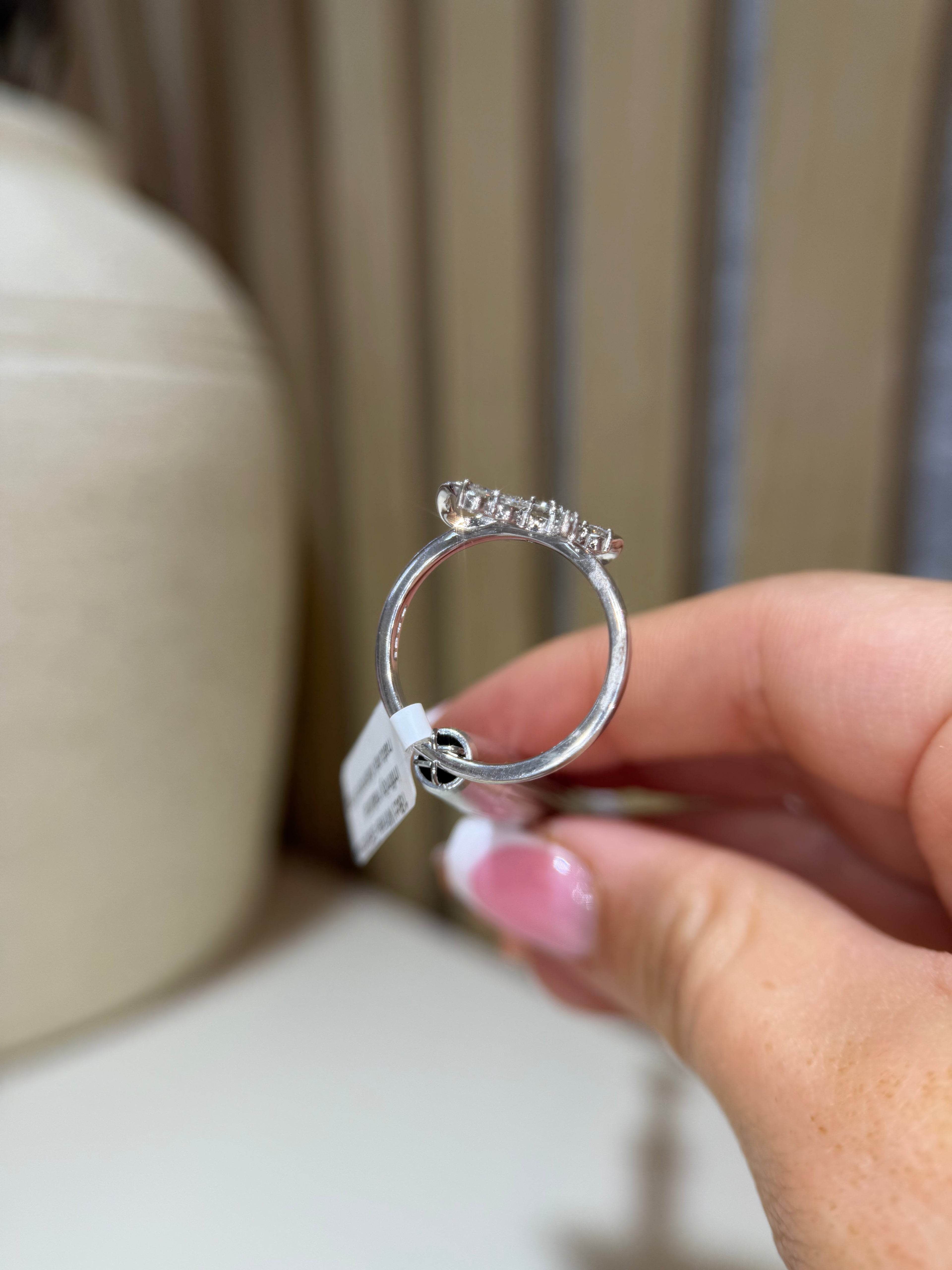 Bow infinity diamond ring side view