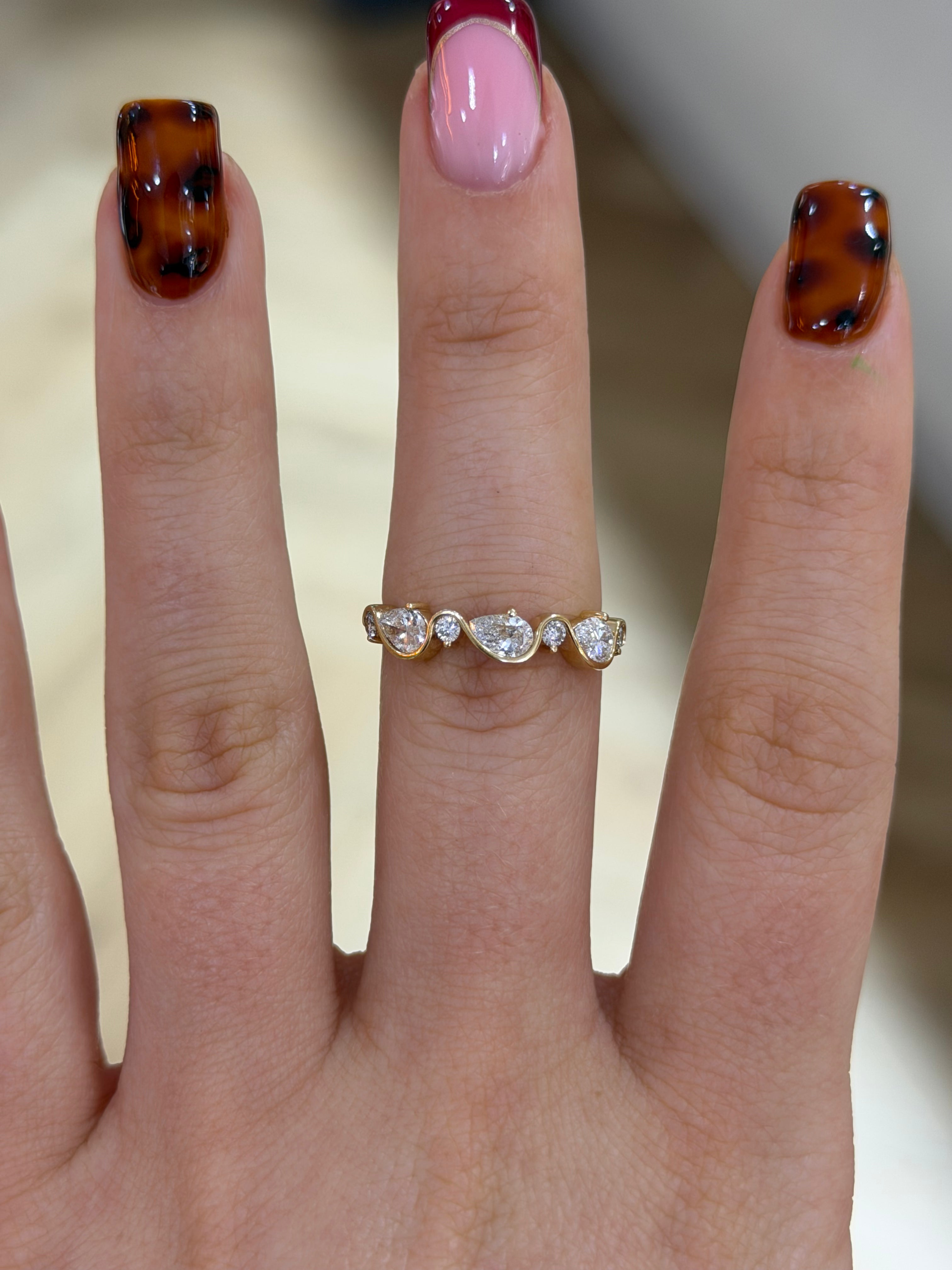 Pear Swirl Eternity Band