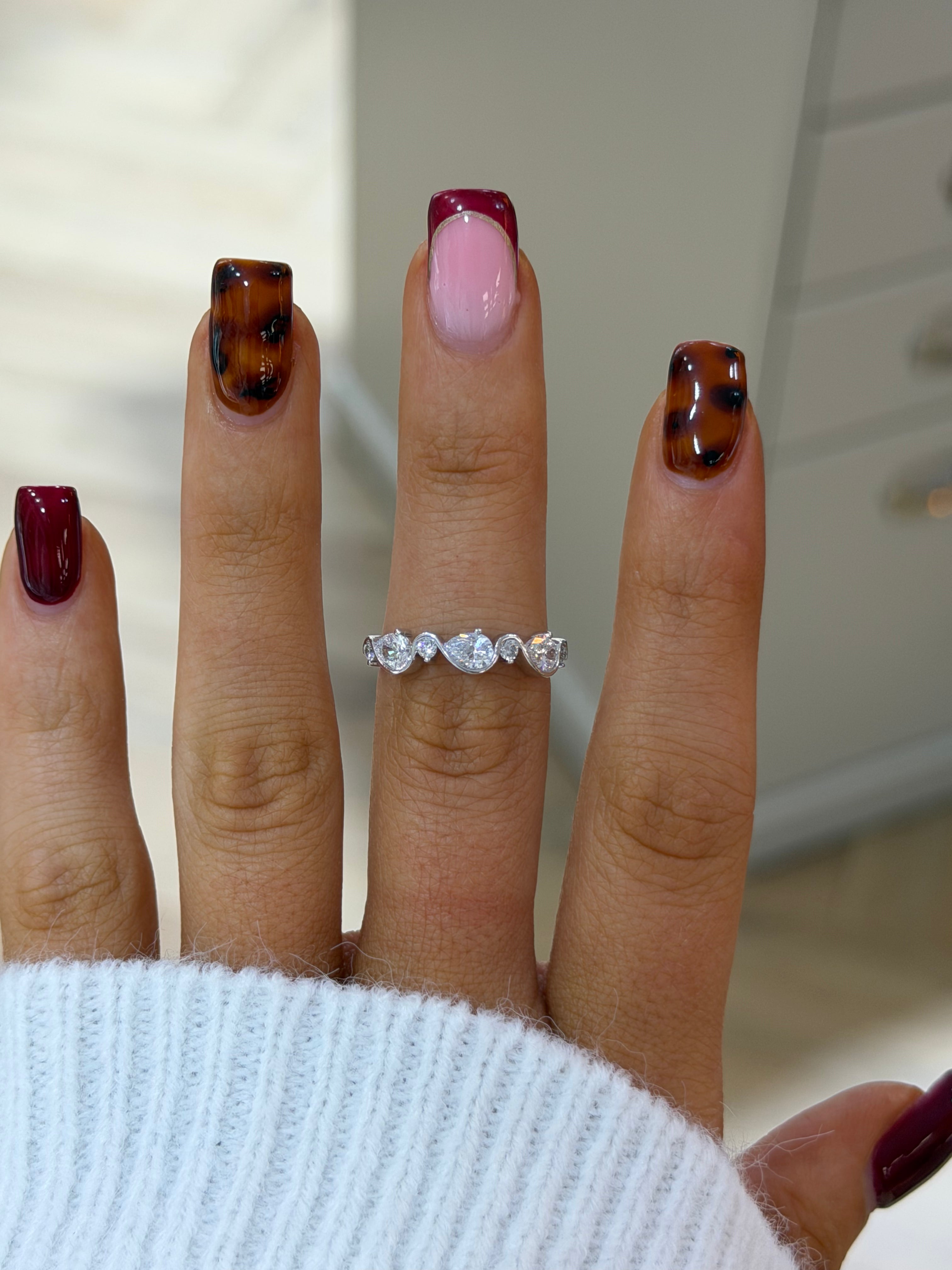 Pear Swirl Eternity Band – White Gold