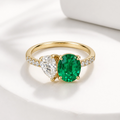 The Eden Ring, lab grown emerald and pear lab diamond toi et moi ring in 9k yellow gold