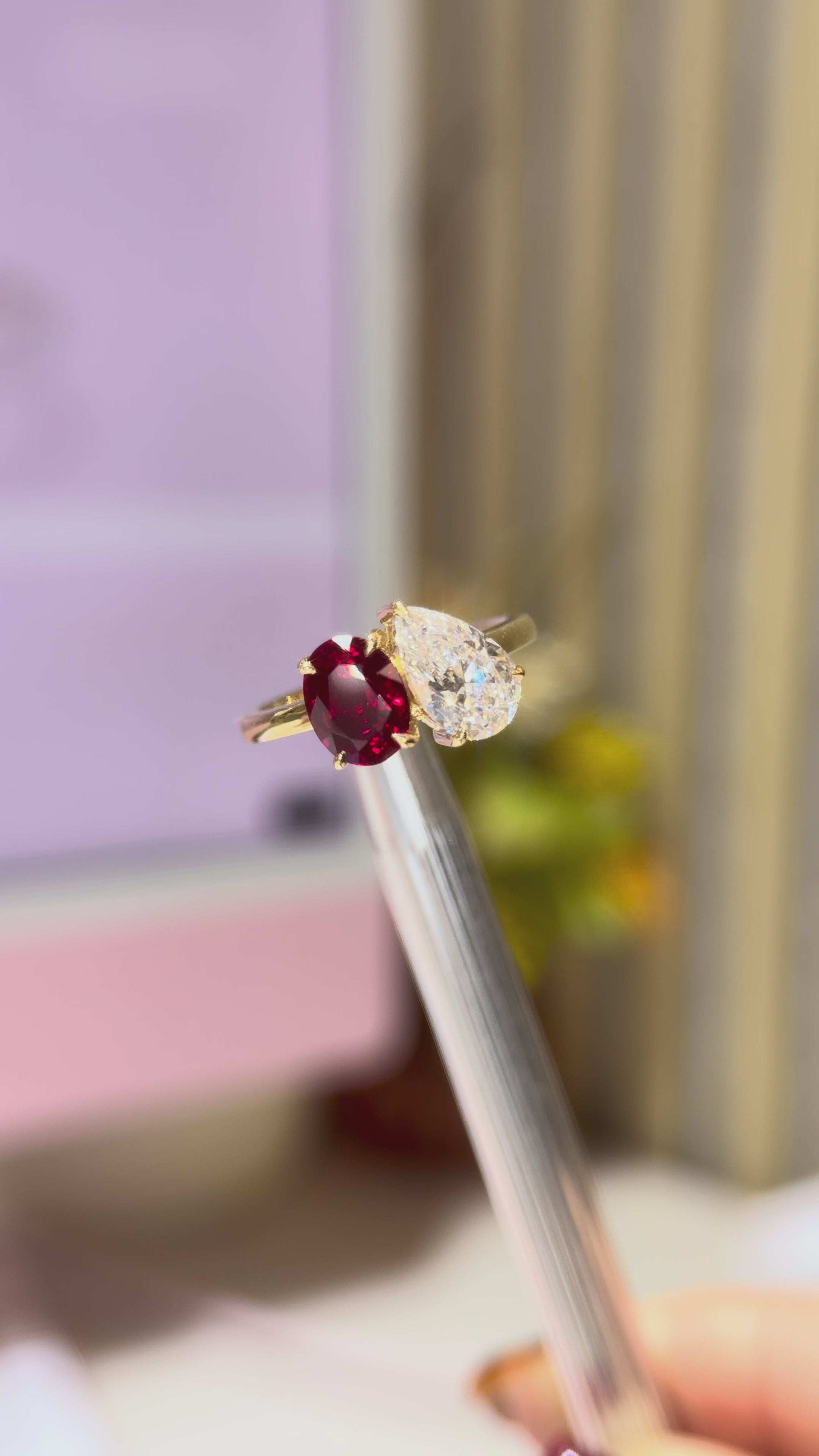 Video of The Scarlet Ring lab diamond and ruby toi et moi ring in 9k yellow gold